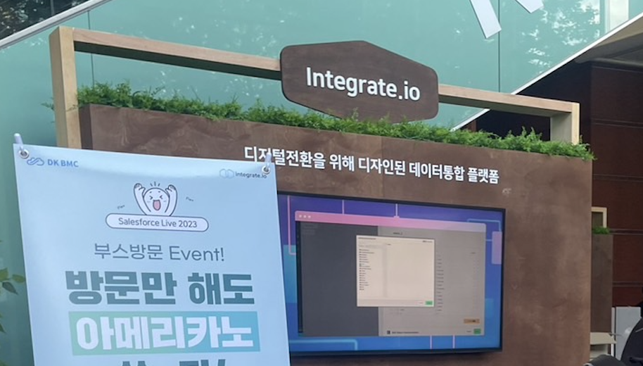 Integrate.io branded booth at Salesforce Live Korea event with company signage